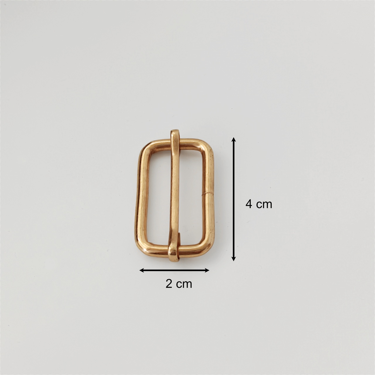 Průvlek kovový zlatý